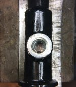 rear master cyclinder where reservoir connects.jpg